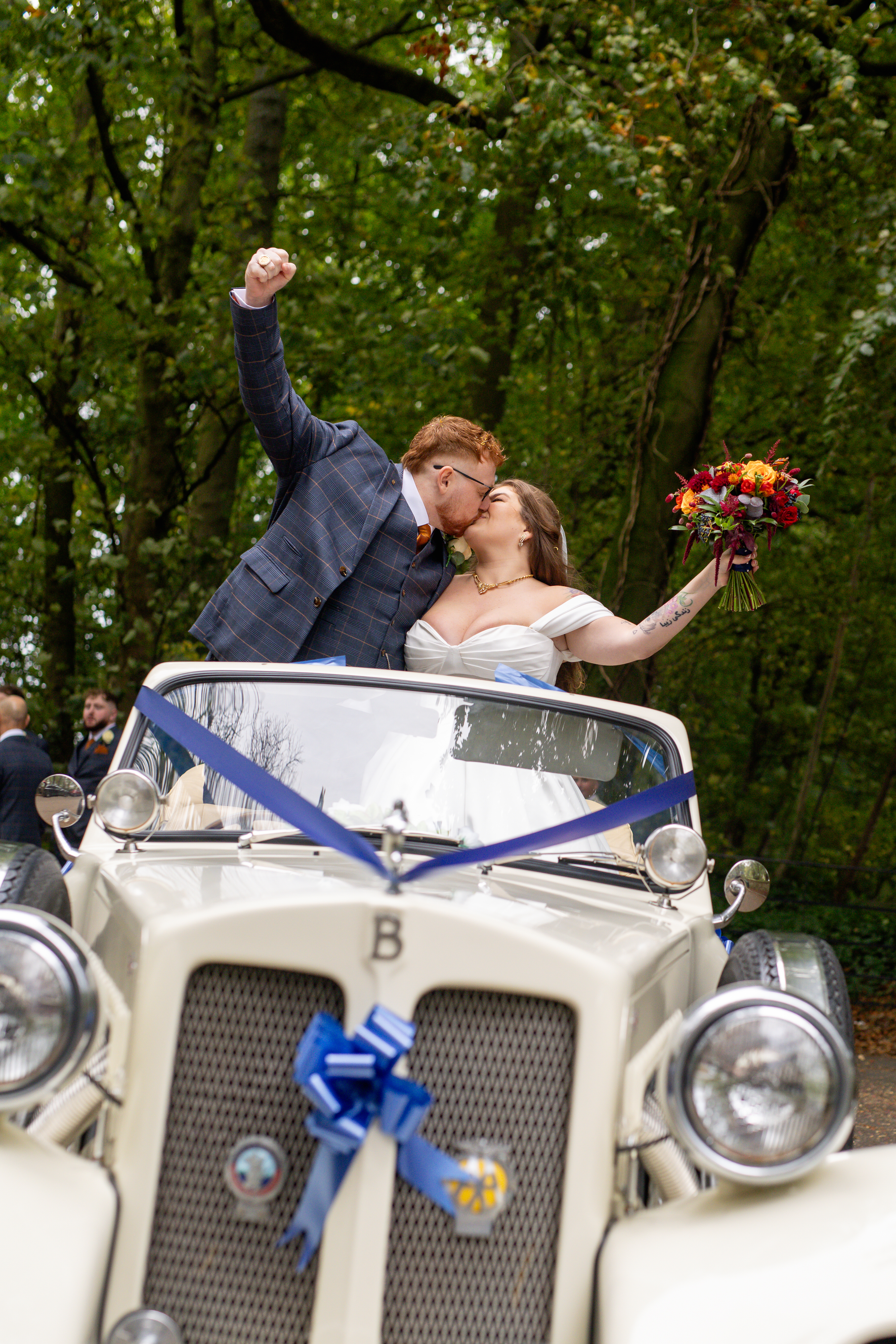 Leila and Samuel in the wedding car 