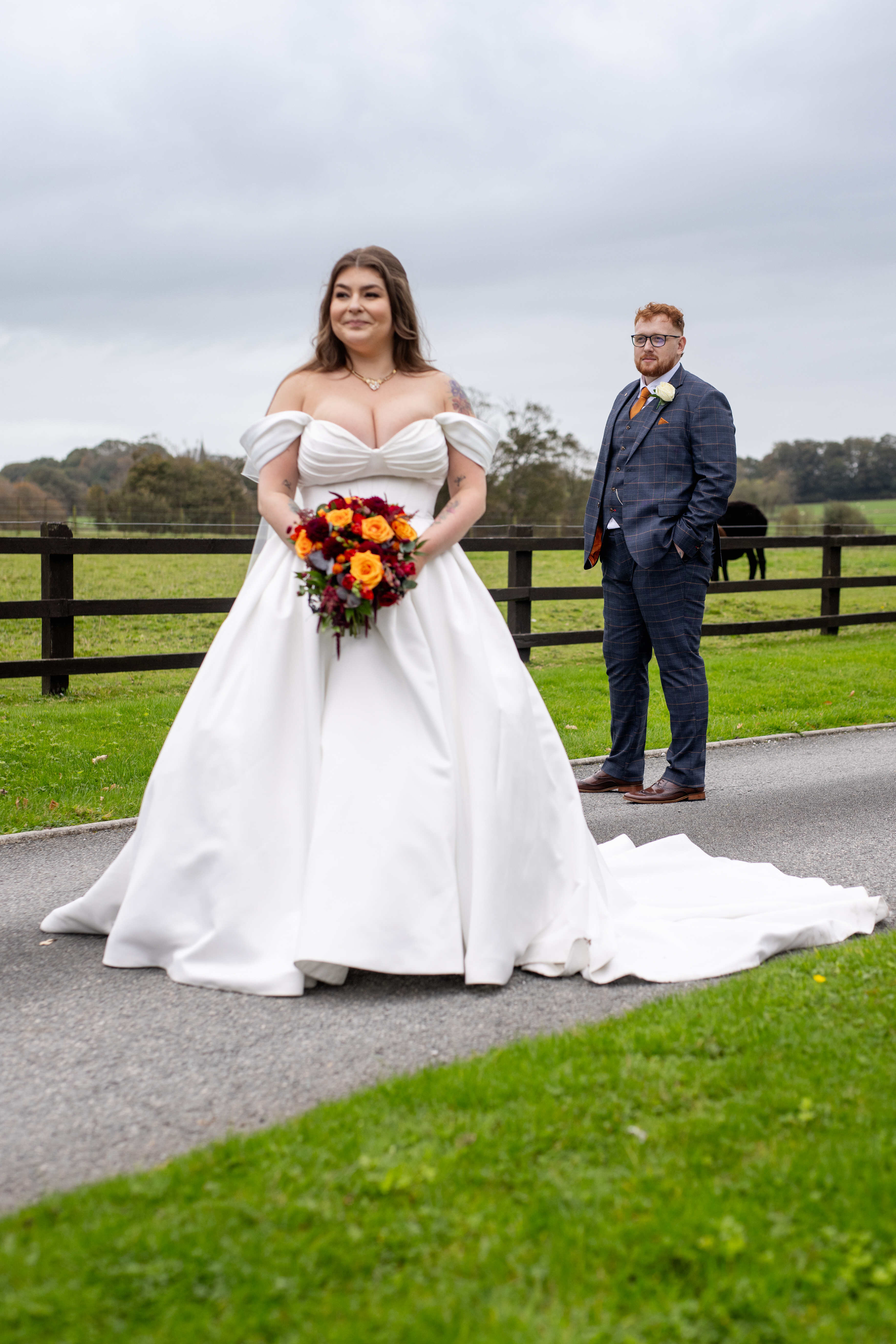 The bride and groom have their photo at Singleton Lodge