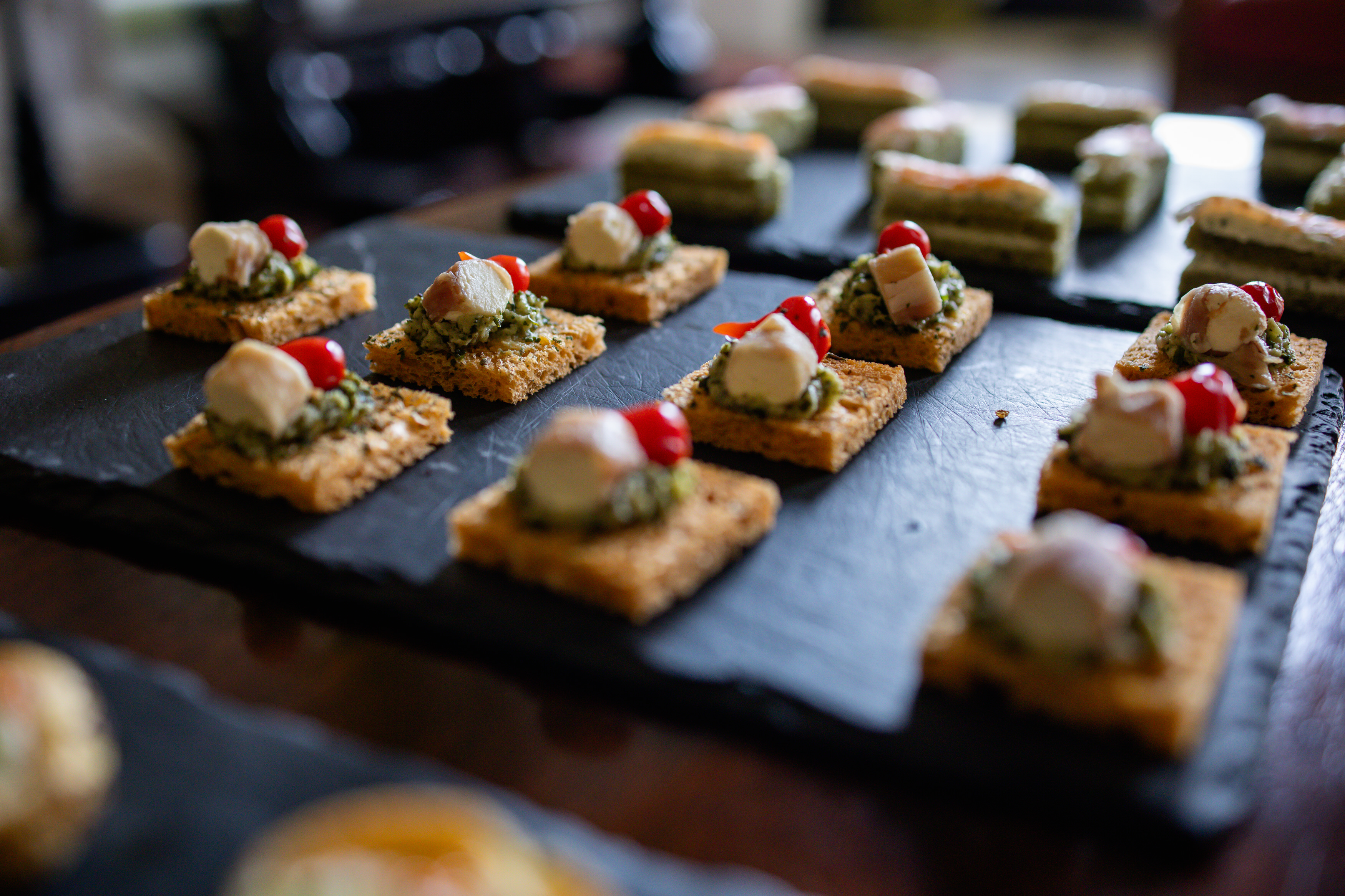 Drinks and canapes are served to the wedding guests 