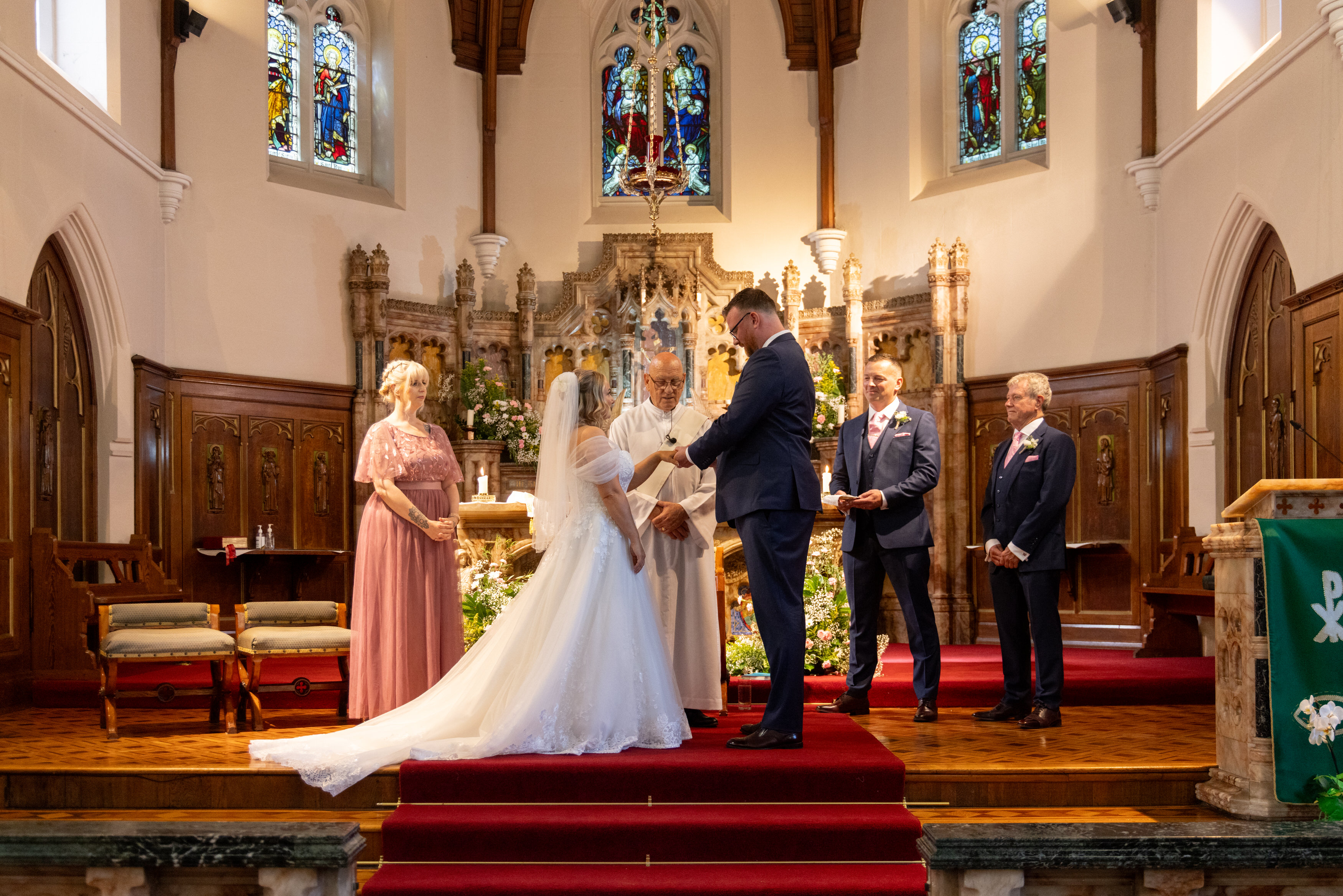 Sean puts Jeanette wedding ring on her finger 