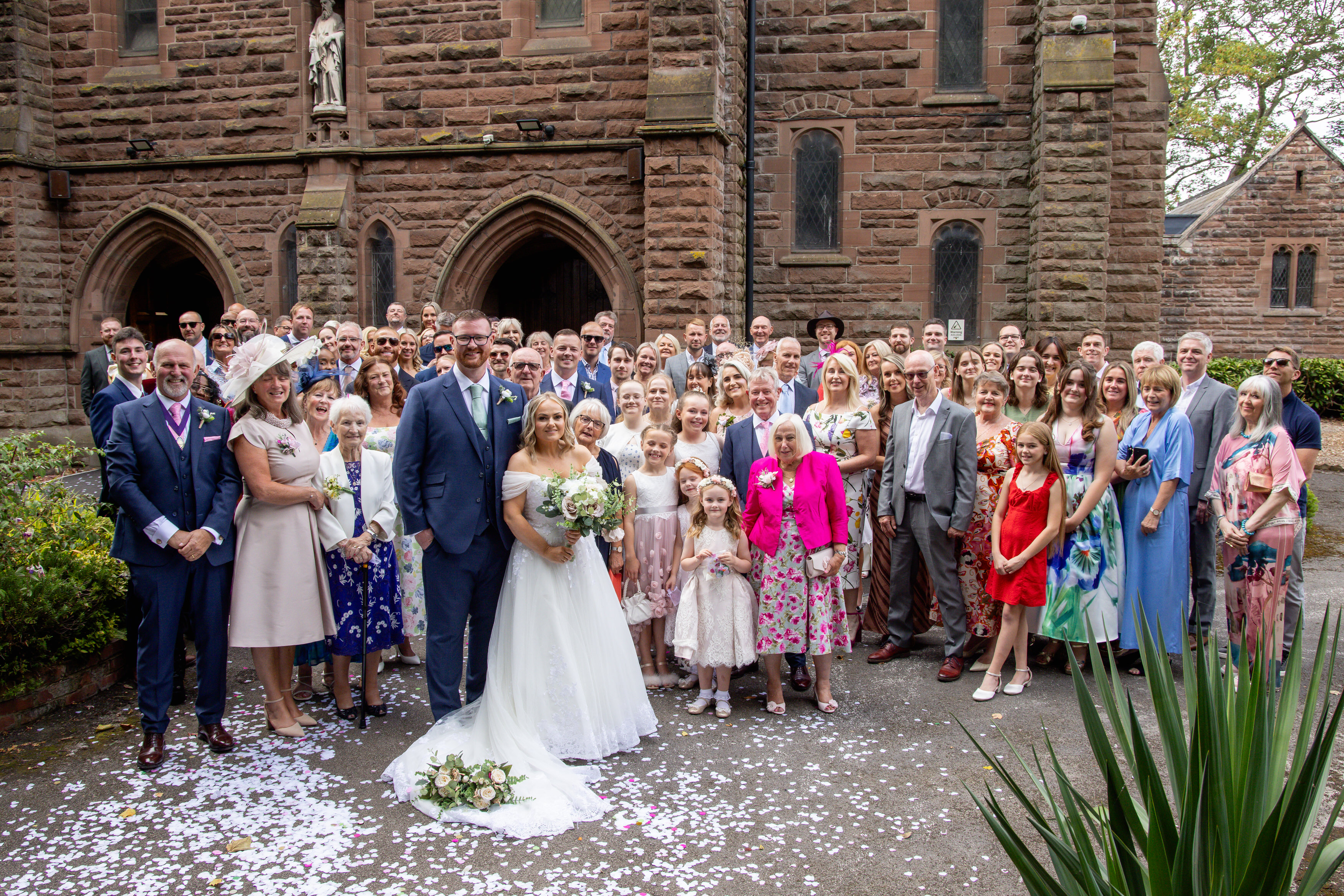A group family and friends wedding photo 