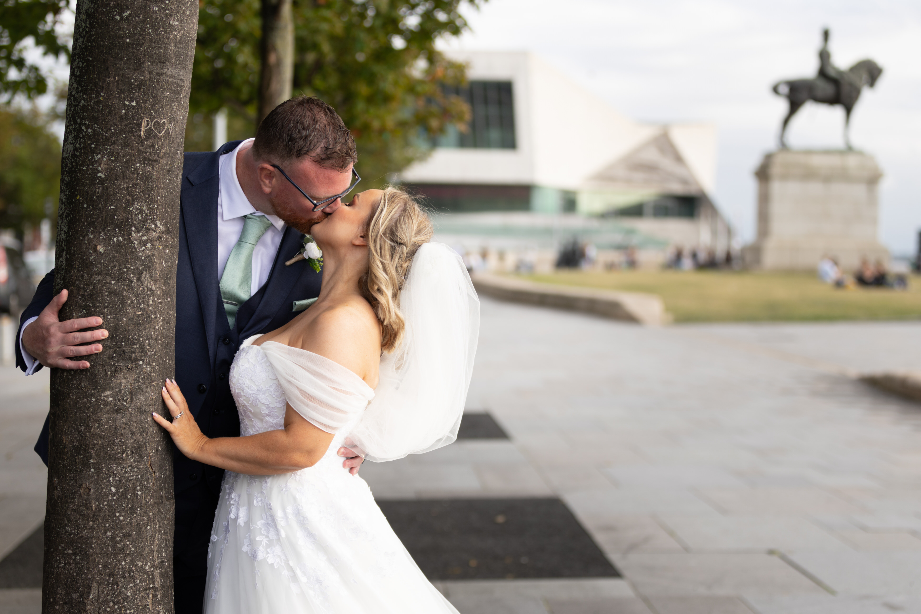 The Bride in groom go for a walk along Liverpool docks 