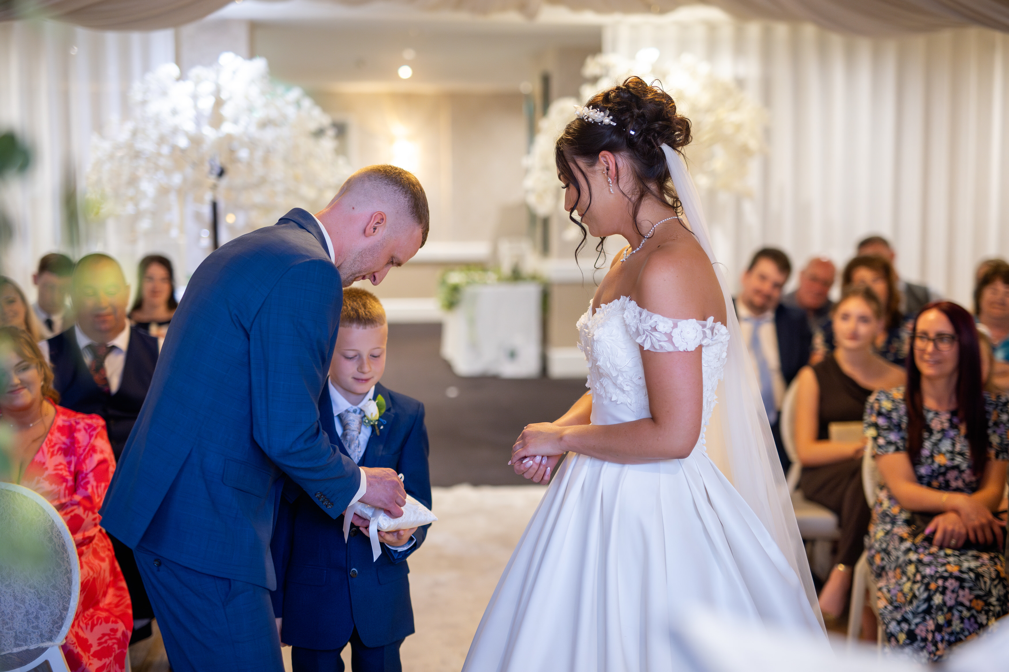 Jon and Katie's son comes forward with the wedding rings