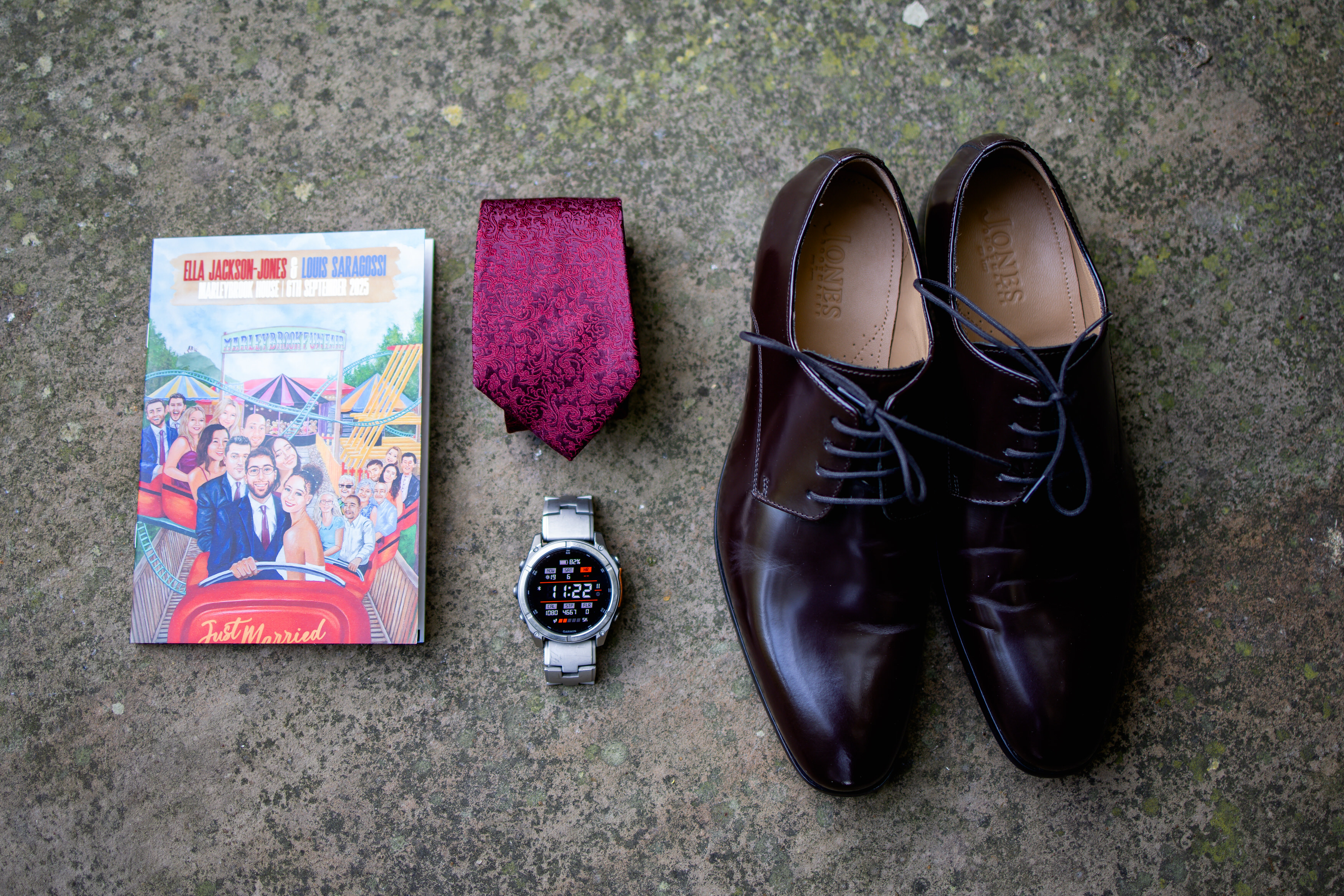 The grooms shoes watch and tie 