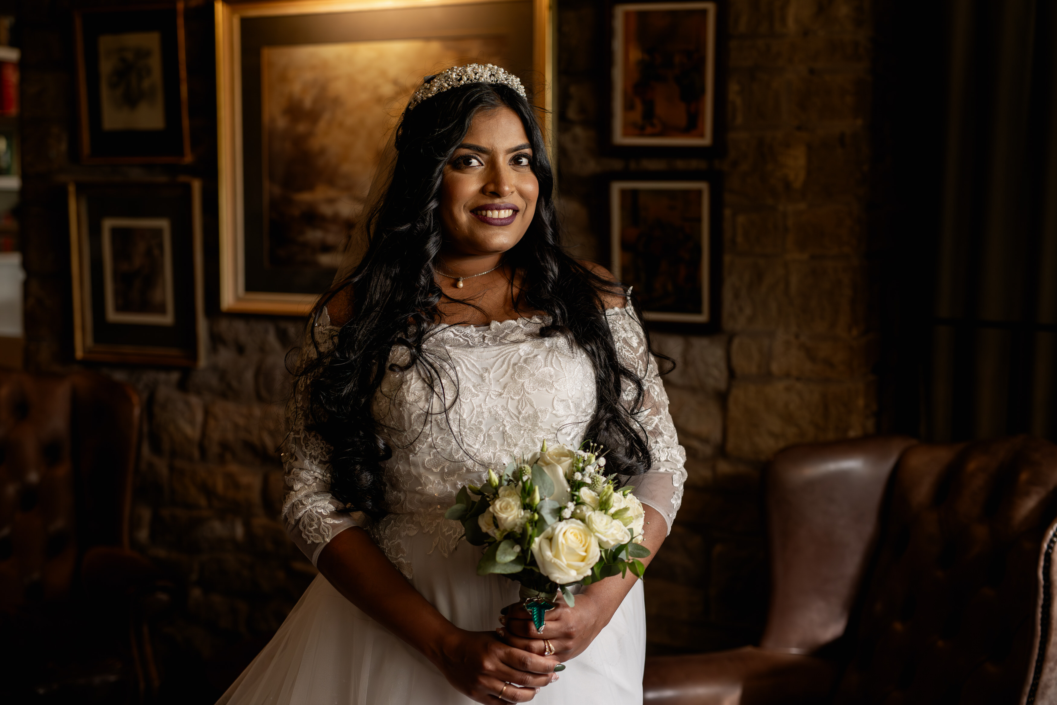 Udara the Bride posing for a photo 